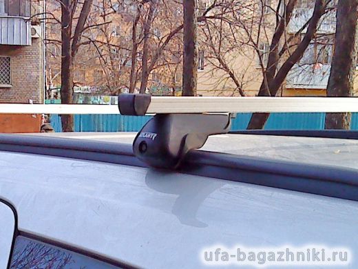 Багажник на крышу Opel Astra, прямоугольные дуги на интегрированные рейлинги, Атлант