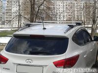 Багажник на крышу Hyundai ix35 с интегрированными рейлингами, Атлант, аэродинамические дуги