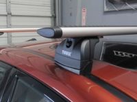 Багажник на крышу Subaru Impreza, Thule, аэродинамические дуги Wingbar