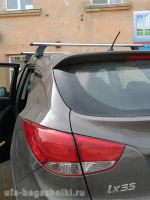 Багажник на крышу на Hyundai ix35 (без рейлингов), Атлант, аэродинамические дуги