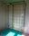 Металлическая шведская стенка с рукоходом, турником, сеткой для лазания, рукоходом, гимнастическим матом, качелями, кольцами, матом. Хорошая комплектация. Модель ДСК Пионер-С4С. Зелено-желтый вариант каркаса и перекладин