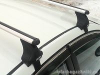 Багажник на крышу Toyota Auris, Атлант: аэродинамические дуги и опоры типа Е