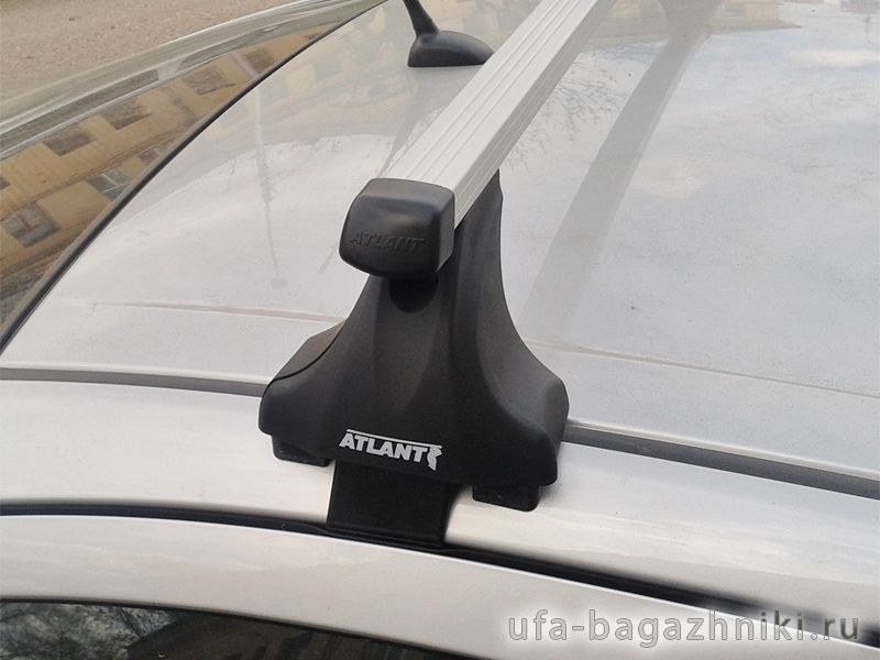 Багажник на крышу Toyota Auris E180 2012-..., Атлант: прямоугольные дуги и опоры типа Е