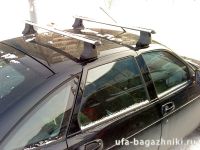 Багажник на крышу на Ладу Приору (Атлант, Россия), аэродинамические дуги