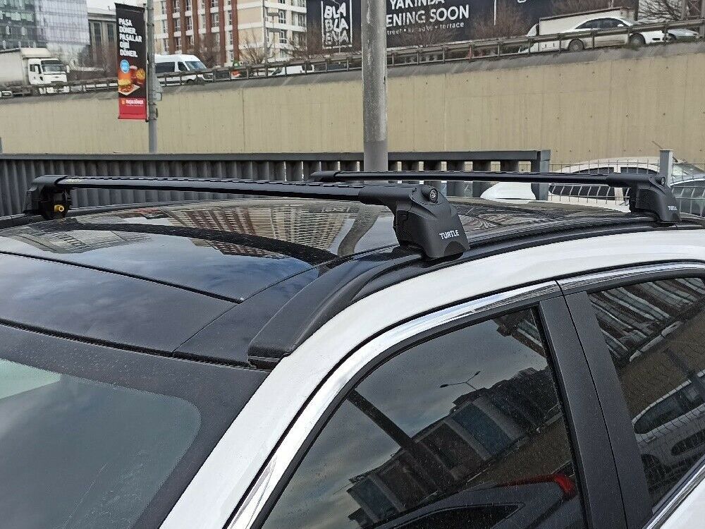 Багажник на крышу Mitsubishi Eclipse Cross, Turtle Air 2, аэродинамические дуги на интегрированные рейлинги (черный цвет)