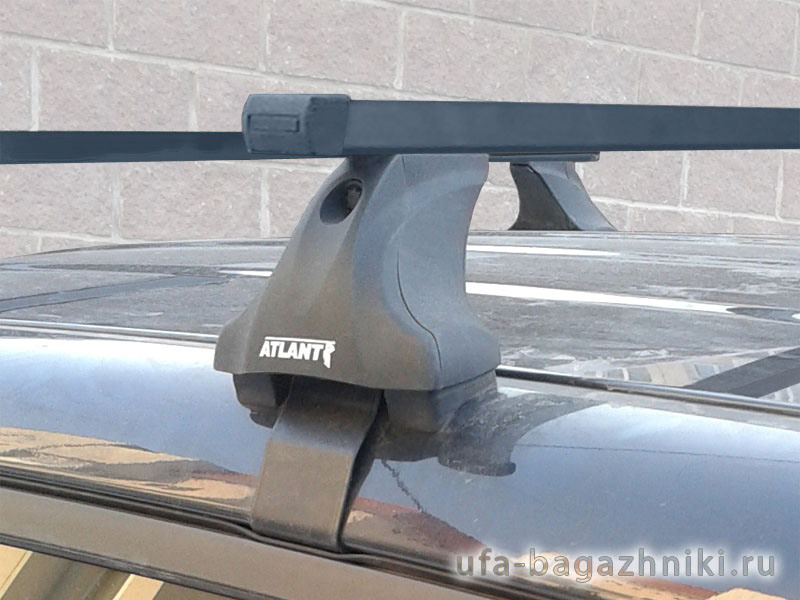 Багажник на крышу Skoda Rapid, Атлант, стальные прямоугольные дуги (в пластике)