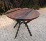 Круглый стол из массива темного дерева