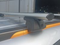 Багажник INTER TITAN i-pro универсальный на низкие (интегрированные) рейлинги с аэро дугами (55 мм) Секретка